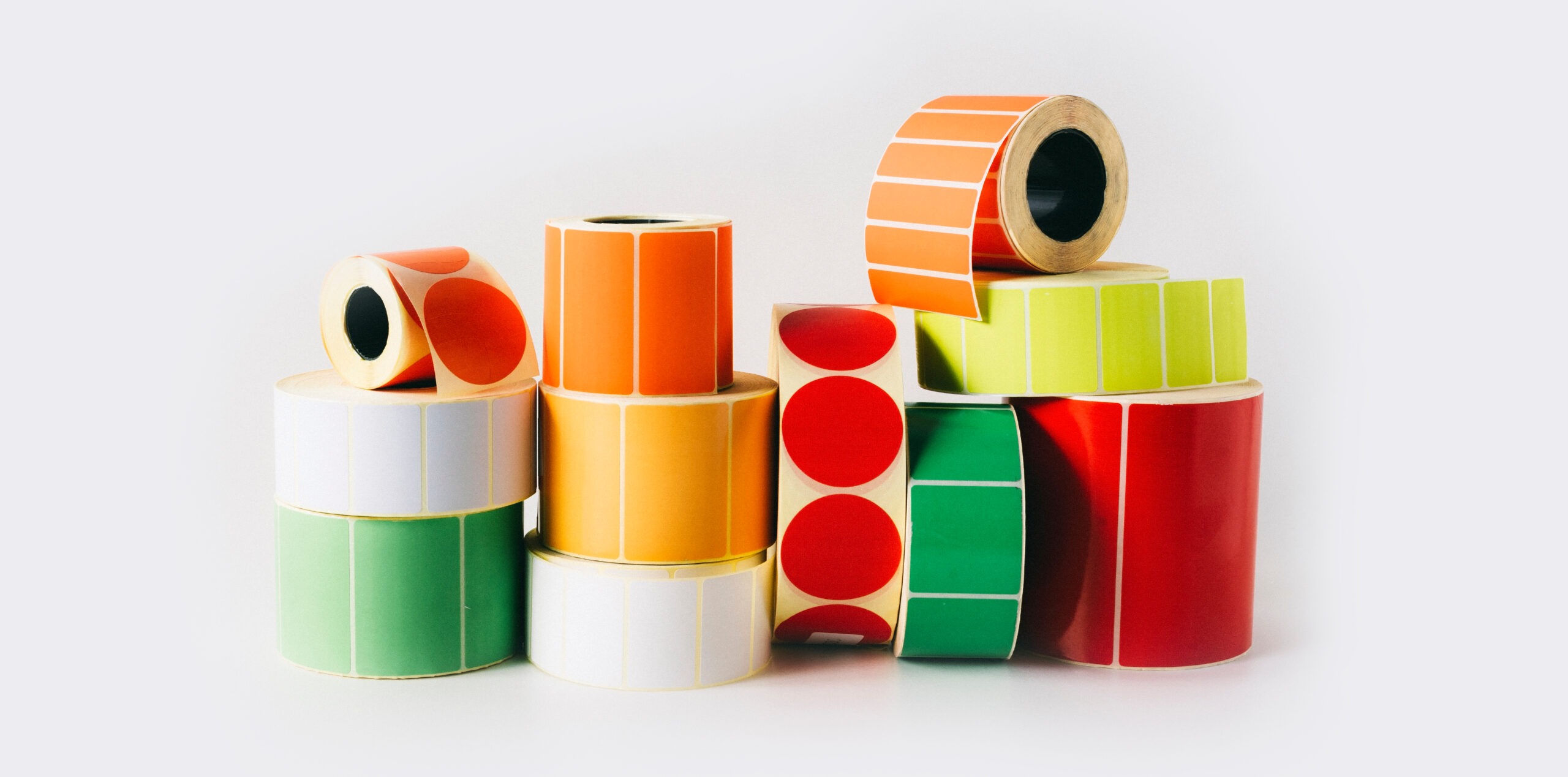 Colored,And,White,Reels,With,Self-adhesive,Labels,For,Printers